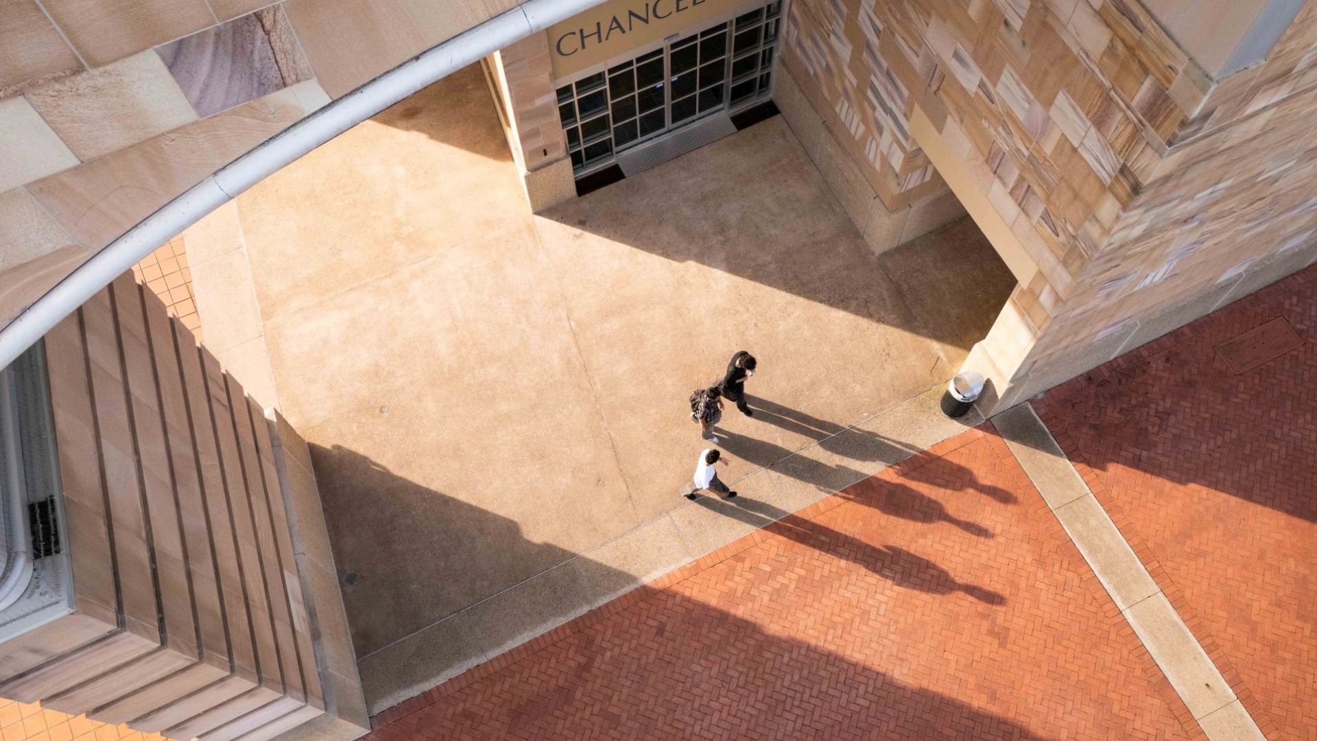 Aerial image of students walking through bond campus
