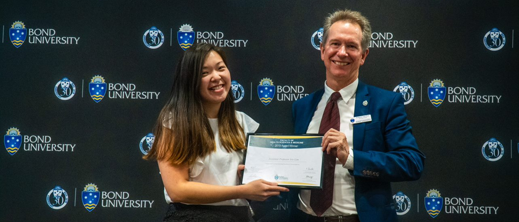 A woman is accepting an award.