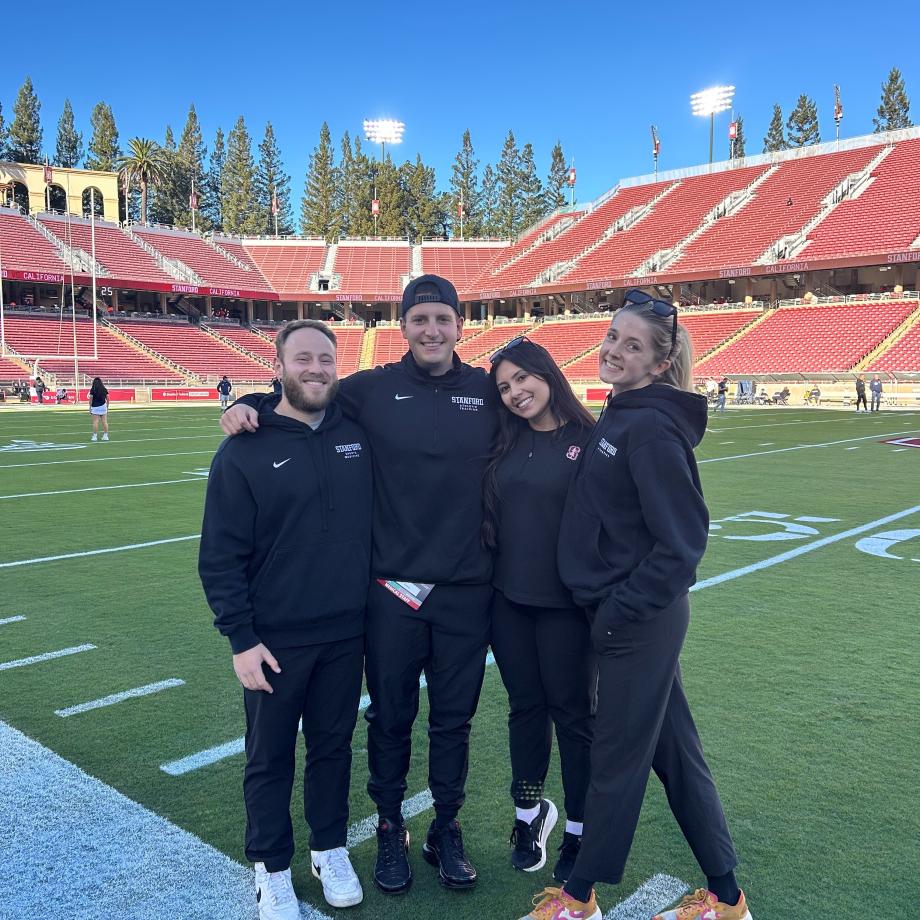 a group of students in a stadium 
