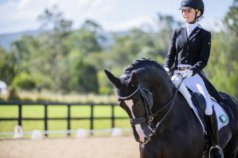Bond law and business student Kate Kyros had the equestrian set scrambling for the record books after a stunning debut dressage appearance  