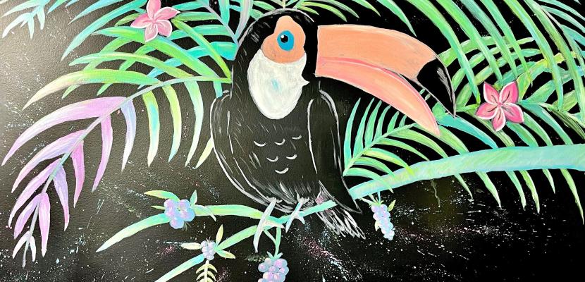 A cartoon painting of a toucan appears on a black background. 