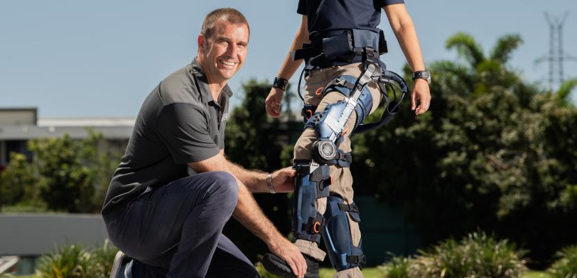 Assistant Professor, Philip Abery with the exoskeleton legs 