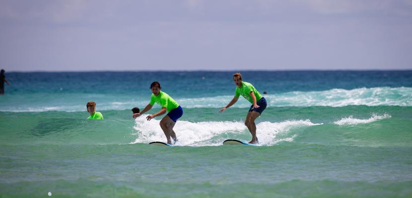 Students surfing at Currumbin Beach 