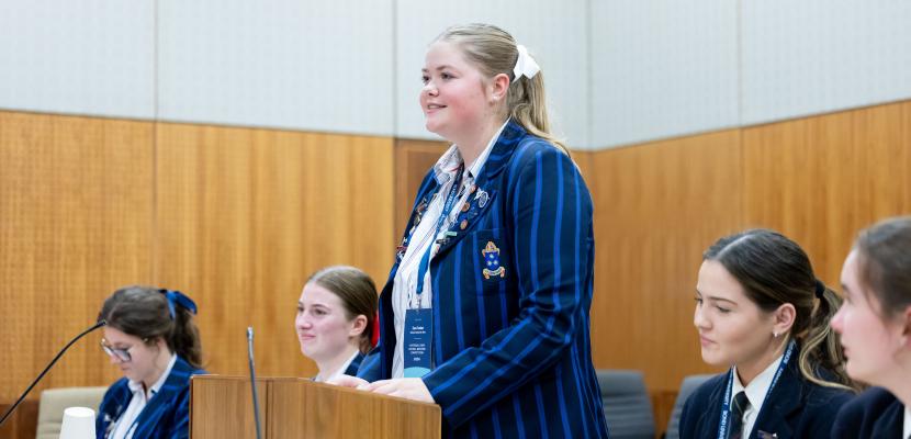 High School student presenting in a court room