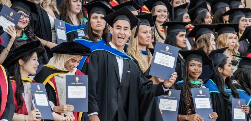 MATTHEW: Matthew Hoang, centre, graduated with a Master of Nutrition and Dietetic Practice.
