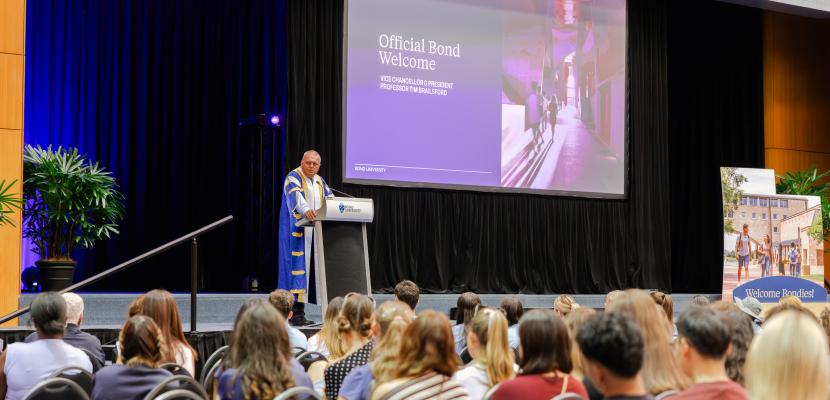 Students sitting in hall for the Orientation week Official Welcome Ceremony by Vice Chancellor Tim Brailsford