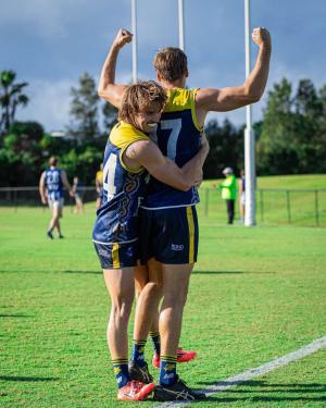 AFL men celebrating